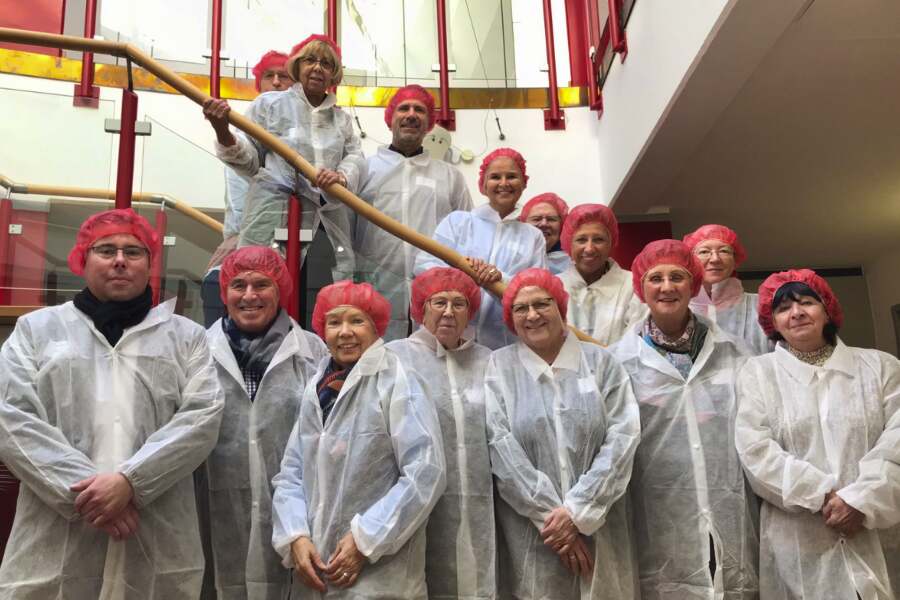 Lionsmitglieder Gruppenbild in Schutzkleidung